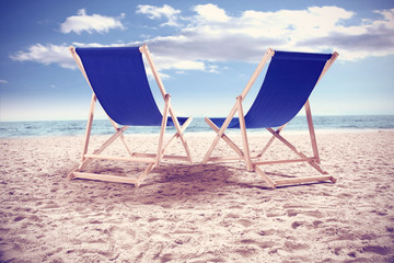 chairs and sand and coast 