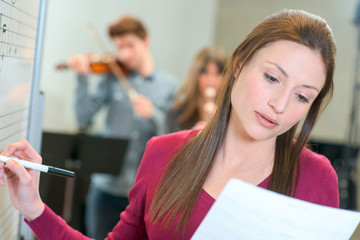 Wall Mural - Music teacher at work