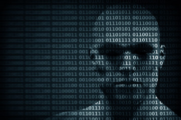 Man face blended with binary code digits. Concept of hacker, data protection etc.