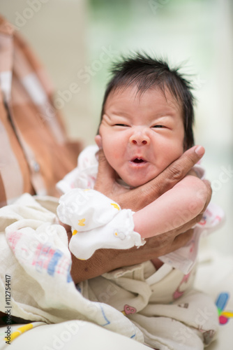 Fotografia, Obraz Grand mom hand holding baby neck make ing belch after drink milk