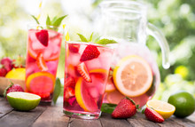 Pink Lemonade With Lemon, Lime And Strawberries 
