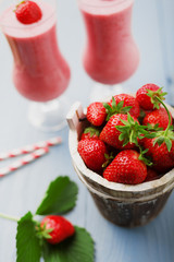 Wall Mural - Delicious strawberry smoothie with milk, prepared with fresh str