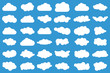 Cloud icons on blue background. 36 different vector clouds. Cloudscape. Isolated clouds.