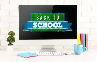 Wall Mural - Back to school message on screen of computer