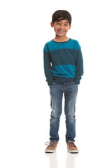 Full length portrait of a young, mixed race boy.  Isolated on white.