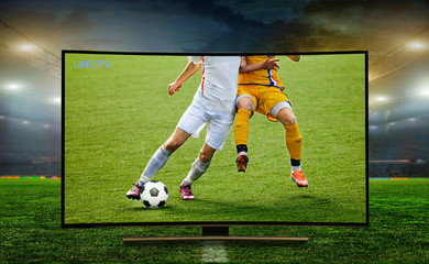 watching smart tv translation of football game.