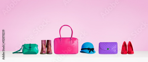Cuadros en Lienzo Colorful hand bags,purse,shoes, and hat isolated on pink background