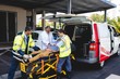 © Wavebreak Media - Injured man with ambulance men