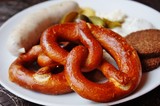 Fototapeta Tulipany - A German breakfast with pretzel and wurst sausage