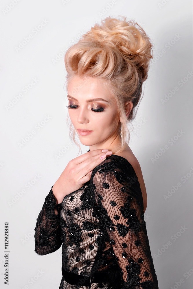 Beautiful lady in elegant black evening dress with updo hairstyle. Fashion  photo. Stock Photo | Adobe Stock