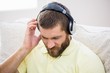 Man listening to music on headphones