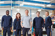 © Connect Images - Portrait manager and team in manufacturing factory