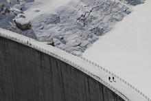 High Angle View Of Snow Covered Dam And Frozen Reservoir