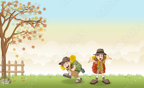 Cute cartoon kids in explorer outfit on a green park