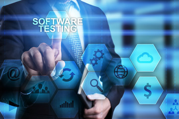 Businessman pressing button on touch screen interface and select software testing. technology concept.