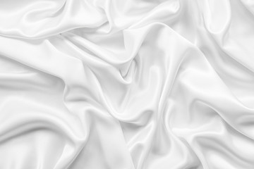 Fototapete - White abstract background with wave pattern of satin fabric.