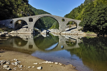 Amazing Reflection of Devil's Bridge in Arda river and Rhodopes mountain, Kardzhali Region, Bulgaria