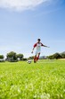© WavebreakMediaMicro - Football player practicing soccer