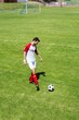 © WavebreakMediaMicro - Football player practicing soccer