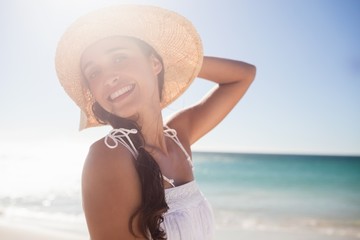 Happy woman posing on the beach