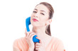 Pretty woman holding telephone as shopping contact concept