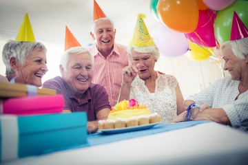 Wall Mural - group of seniors celebrating a birthday