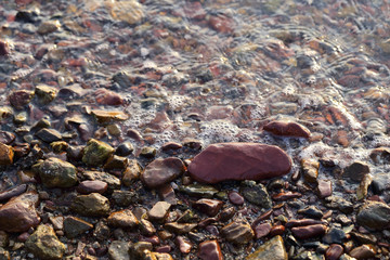 Sea pebble, close up of gravel beach for background.