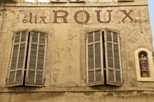 Large Painted Letters On Ancient Wall, With Statue Of The Virgin, And Wood Shutters, Old Aix, Aix En Provence, Provence, France