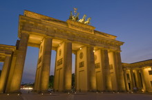 The Brandenburg Gate With The Quadriga Winged Victory Statue On Top Illuminated At Night, Pariser Platz, Berlin, Germany
