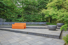 Orange Sofa In The Inner Courtyard Garden