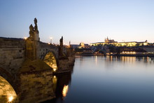 Evening Light, Charles Bridge, St. Vitus's Cathedral In The Distance, Seen From Across The River Vltava, Prague, Czech Republic