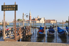 Gondolas Moored On The Lagoon, San Giorgio Maggiore Beyond, Riva Degli Schiavoni, Venice, Veneto