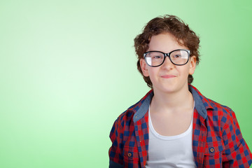 Portrait of young boy wearing glasses