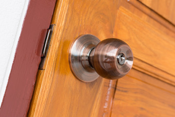 Wall Mural - door knob and keyhole on wooden door