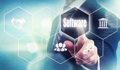 Businessman pushing a software concept button.