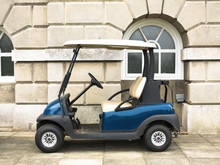 Blue Golf Buggy Parked Outside Against A Georgian Style Building