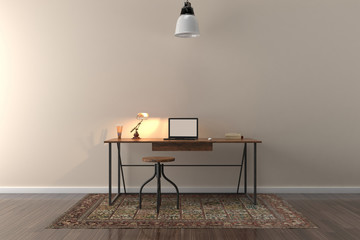 Work desk in empty room with big wall in background