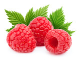 Fototapeta  - Three ripe raspberries with green leaf isolated on white background with clipping path