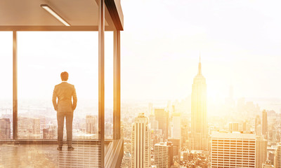 Businessman on balcony back toning