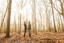 Couple In Forest In Autumn