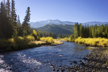 Scenic View Of River Against Mountains