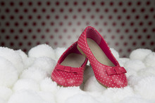 Red Shoes With Polka Dots For Girls / Portrait Of A Pair Of Lacquered Shoes For Little Girl