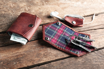 Poster - Leather wallet and accessories on wooden table