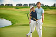 © Yakobchuk Olena - Young couple on golf course