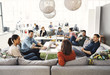 © Maskot - Group of people discussing in creative office