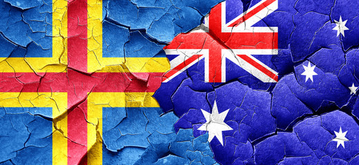 aland islands with Australia flag on a grunge cracked wall