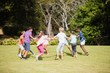© WavebreakMediaMicro - Kids playing together during a sunny day