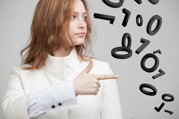 woman working with binary code, concept of digital technology.