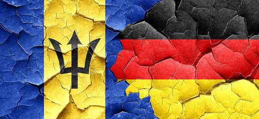 Barbados flag with Germany flag on a grunge cracked wall