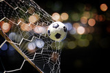 Fototapeta Sport - soccer ball in goal